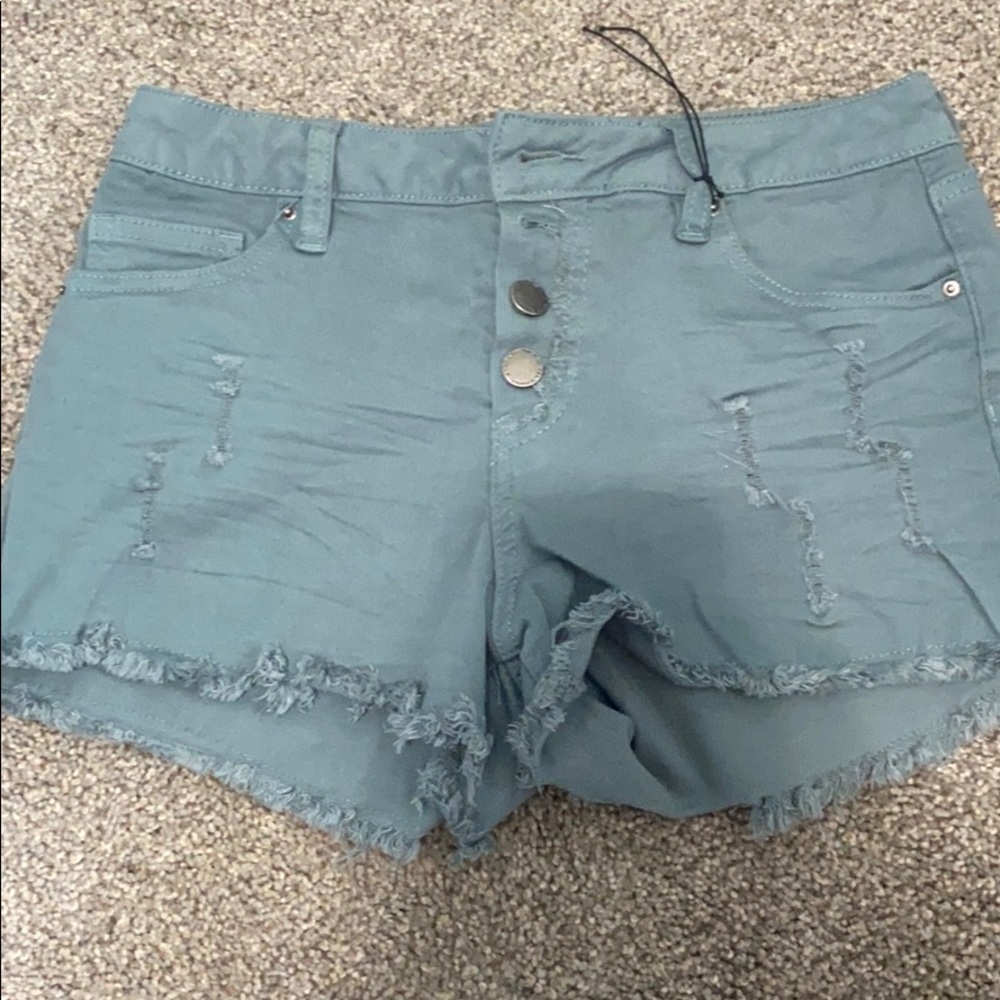 blue-green jean shorts